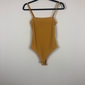 Prettylittlething mustard color bodysuit tank top
